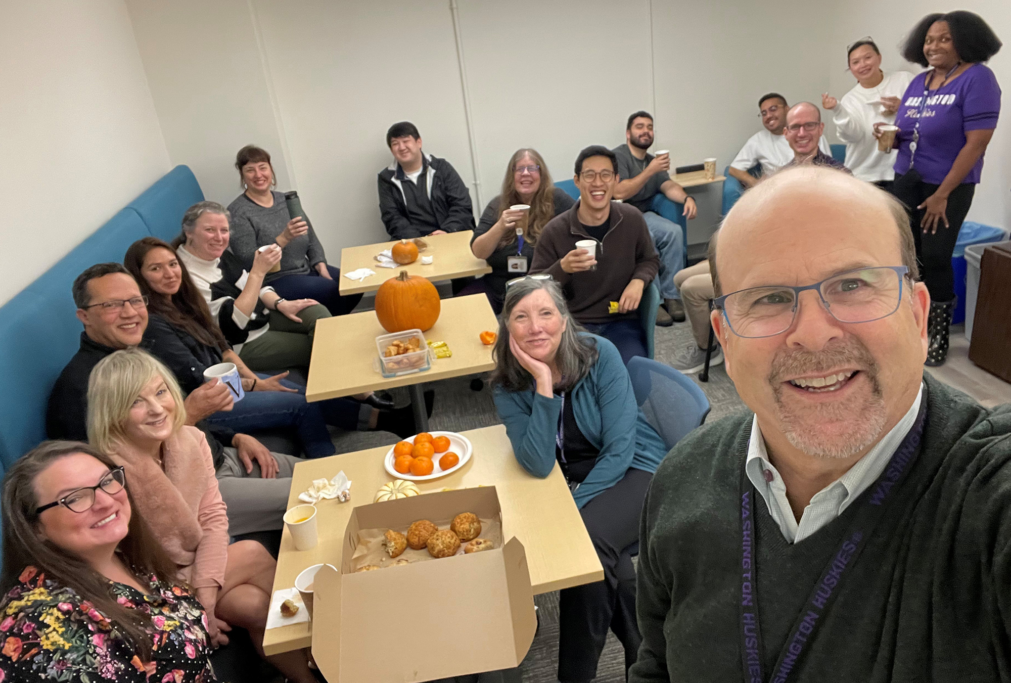 Group of employees at "tea time" reconnection event