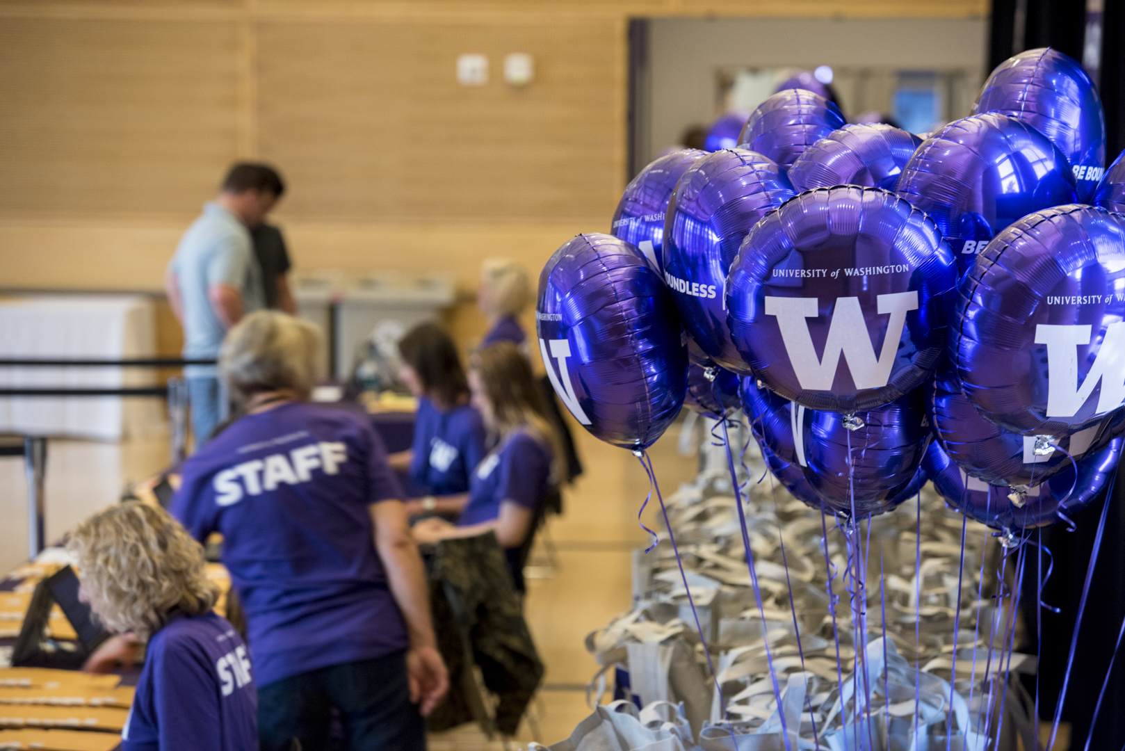 Staff at event with UW balloons