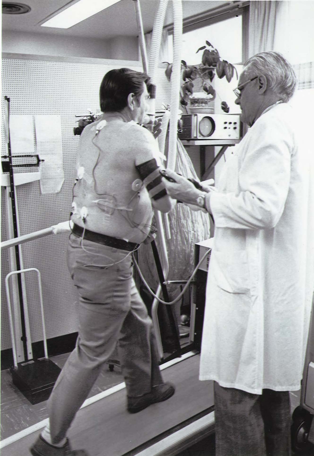 Dr. Robert Bruce with patient on treadmill
