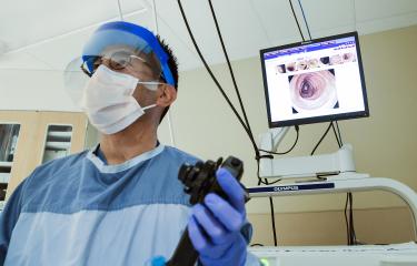 Doctor performing colonoscopy 